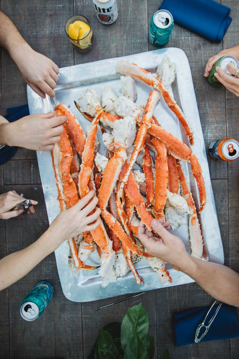 hand grabbing crabs