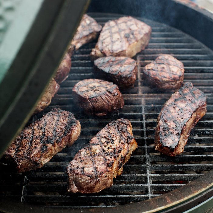 Grilled steaks on a barbecue grill