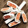 Group of Floatie Keychains with orange crab claw and Alaskan King Crab Co. Logo.