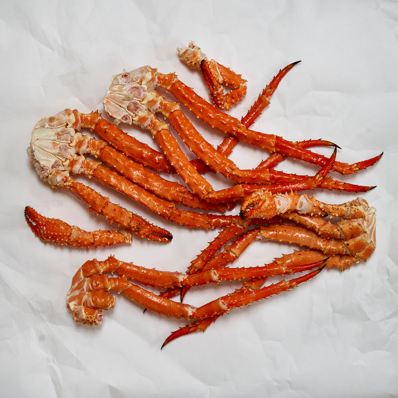 Golden king crab cluster on parchment paper