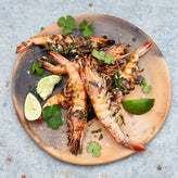 Cooked Caledonia blue prawns seasoned on a plate 