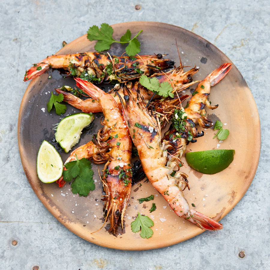 Cooked Caledonia blue prawns seasoned on a plate 