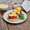 Smoked Coho Salmon with Cracked Black Pepper Eggs Benedict with coffee and hollandaise on the side 