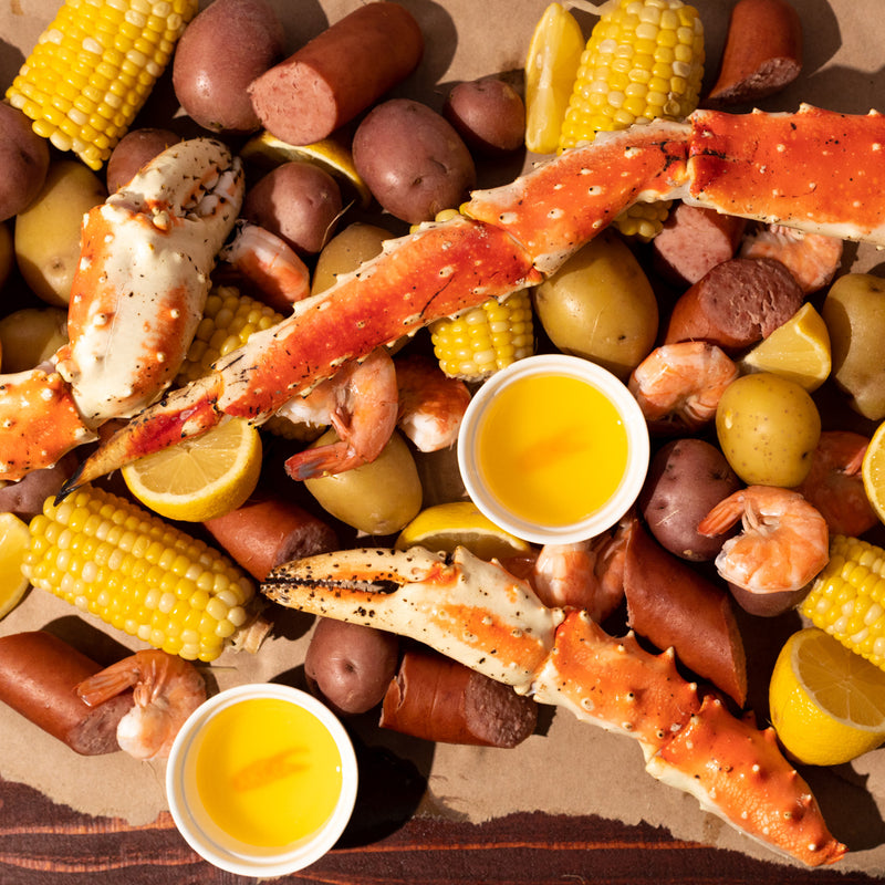 Large Golden King Crab Legs, Ramekins, Butter, & Mr. Stick's Seafood Seasoning Bundle